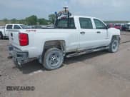 ✅ 2017 Chevrolet Silverado 2500HD Work Truck • VIN: 1GC1KUEY0HF217335 • Lot: 42310735. Listed on IAAI with 107,781 mi. Free auction sales archive from the USA and detailed vehicle history report at DreamBid. Image 4.