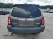 ✅ 2005 Mazda Tribute i • VIN: 4F2YZ02Z45KM64196 • Lot: 64272895. Listed on Copart with 158,256 mi. Free auction sales archive from the USA and detailed vehicle history report at DreamBid. Image 6.