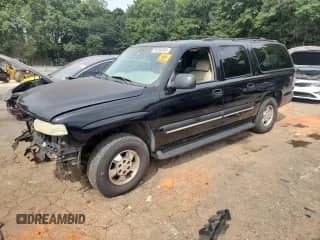 2001 Chevrolet Suburban LS z VIN 3GNEC16T11G178914, wystawiony jako Copart lot #70394655 z przebiegiem 301 844 mil mil oraz Szkoda całkowita • Salvage title. Historia ofert i sprzedaży dostępna na DreamBid. Obrazek 1.