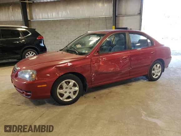 2006 Hyundai Elantra GLS with VIN KMHDN46D16U324883, listed as a Copart auction lot 84821305 with 59,301 mi miles and Salvage title. Bid and sale history available at DreamBid. Image 1.