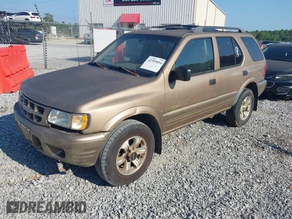 ✅ 2001 Isuzu Rodeo S • VIN: 4S2CK58W714300131 • Lot: 42993854. Wystawiony na IAAI z przebiegiem 332 181 mil. Bezpłatny archiwum sprzedaży aukcyjnych z USA i szczegółowy raport historii pojazdu na DreamBid. Zdjęcie 2.