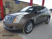 ✅ 2014 Cadillac SRX Performance Collection • VIN: 3GYFNCE34ES548285 • Lot: 43656200. Listed on IAAI with 122,582 mi. Free auction sales archive from the USA and detailed vehicle history report at DreamBid. Image 17.