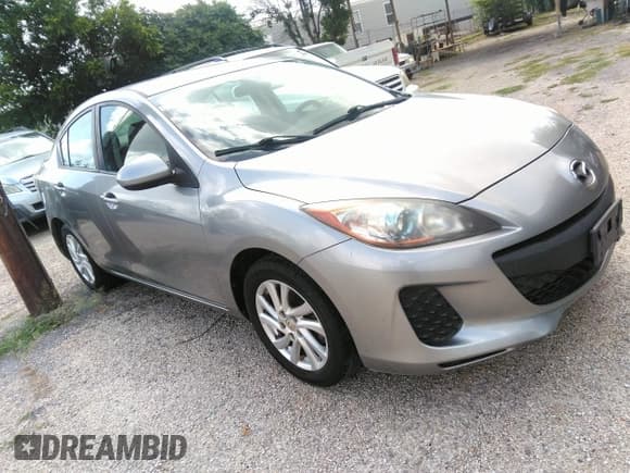 ✅ 2012 Mazda 3 i Touring • VIN: JM1BL1V83C1622692 • Lot: 42447571. Listed on IAAI with 136,065 mi. Free auction sales archive from the USA and detailed vehicle history report at DreamBid. Image 1.