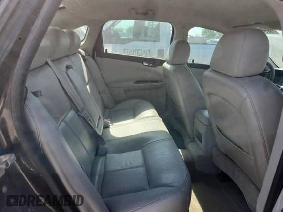 2007 Chevrolet Impala LTZ z VIN 2G1WU58R679149732, wystawiony jako Copart lot #63986115 z przebiegiem 203 659 mil mil oraz Szkoda całkowita • Salvage title. Historia ofert i sprzedaży dostępna na DreamBid. Obrazek 10.