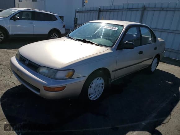 ✅ 1995 Toyota Corolla DX • VIN: 1NXAE09B8SZ301102 • Lot: 77038034. Wystawiony na Copart z przebiegiem 140 375 mil. Bezpłatny archiwum sprzedaży aukcyjnych z USA i szczegółowy raport historii pojazdu na DreamBid. Zdjęcie 1.