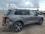 ✅ 2017 Volkswagen Touareg Wolfsburg Edition • VIN: WVGRF7BP3HD002656 • Lot: 71020515. Listed on Copart with 113,231 mi. Free auction sales archive from the USA and detailed vehicle history report at DreamBid. Image 3.