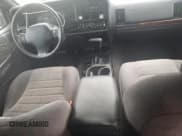 ✅ 1998 Jeep Grand Cherokee Laredo • VIN: 1J4FX58S3WC144684 • Лот: 67226694. Опубликован ранее на Copart с пробегом 106 602 миль. Бесплатный доступ к архиву аукционных продаж из США и подробный отчёт об истории автомобиля на DreamBid. Изображение 8.