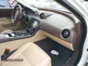 ✅ 2017 Jaguar XJ Portfolio • VIN: SAJWA2G73H8W04310 • Lot: 40914491. Listed on IAAI with 62,102 mi. Free auction sales archive from the USA and detailed vehicle history report at DreamBid. Image 5.