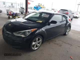 2013 Hyundai Veloster w/Black Int with VIN KMHTC6AD3DU160506, listed as a IAAI auction lot 43547188 with 174,692 mi miles and . Bid and sale history available at DreamBid. Image 2.