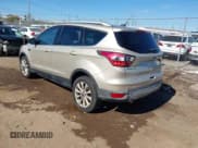 ✅ 2017 Ford Escape Titanium • VIN: 1FMCU9J95HUD82688 • Лот: 43528251. Опубликован ранее на IAAI с пробегом 82 076 миль. Бесплатный доступ к архиву аукционных продаж из США и подробный отчёт об истории автомобиля на DreamBid. Изображение 3.