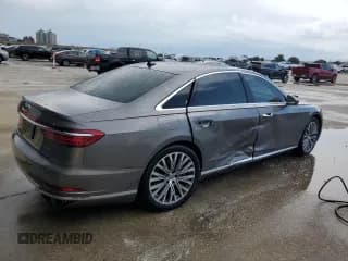✅ 2019 Audi A8 • VIN: WAU8DAF87KN018945 • Лот: 57226464. Опубликован ранее на Copart с пробегом 39 530 миль. Бесплатный доступ к архиву аукционных продаж из США и подробный отчёт об истории автомобиля на DreamBid. Изображение 3.