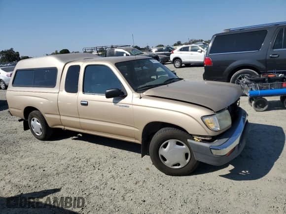 ✅ 1999 Toyota Tacoma • VIN: 4TAVL52N5XZ448920 • Lot: 80413115. Listed on Copart with 51,839 mi. Free auction sales archive from the USA and detailed vehicle history report at DreamBid. Image 4.