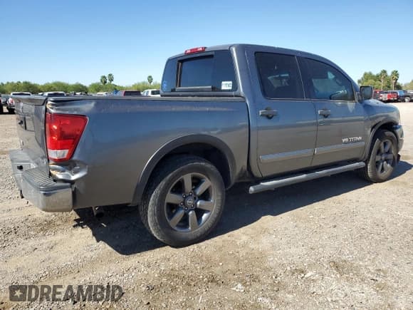 ✅ 2015 Nissan Titan SL • VIN: 1N6BA0ED0FN501061 • Лот: 81819584. Опубликован ранее на Copart с пробегом 311 754 миль. Бесплатный доступ к архиву аукционных продаж из США и подробный отчёт об истории автомобиля на DreamBid. Изображение 3.