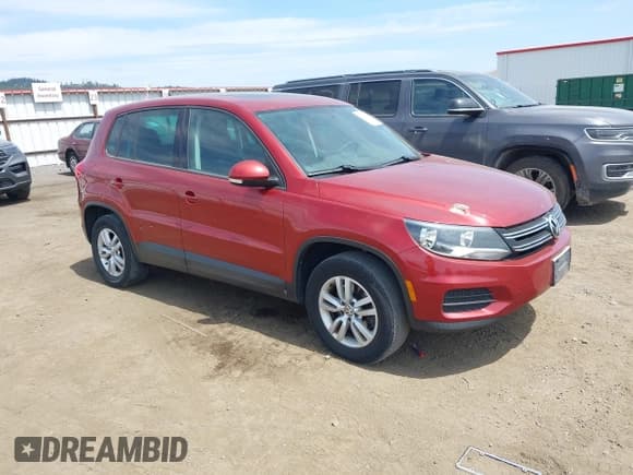 ✅ 2012 Volkswagen Tiguan LE • VIN: WVGAV7AX5CW097459 • Lot: 42526659. Listed on IAAI with 158,634 mi. Free auction sales archive from the USA and detailed vehicle history report at DreamBid. Image 1.