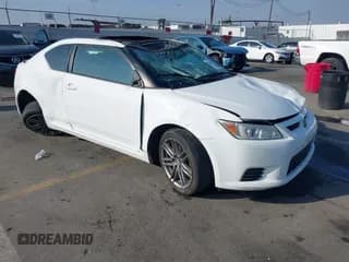 ✅ 2012 Scion tC • VIN: JTKJF5C76C3032097 • Lot: 40989887. Wystawiony na IAAI z przebiegiem 165 244 mil. Bezpłatny archiwum sprzedaży aukcyjnych z USA i szczegółowy raport historii pojazdu na DreamBid. Zdjęcie 1.