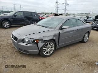 ✅ 2007 Volvo C70 • VIN: YV1MC68287J025955 • Лот: 69390994. Опубликован ранее на Copart с пробегом 66 851 миль. Бесплатный доступ к архиву аукционных продаж из США и подробный отчёт об истории автомобиля на DreamBid. Изображение 1.