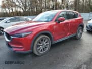 ✅ 2021 Mazda CX-5 Grand Touring • VIN: JM3KFBDM8M0320552 • Лот: 91934415. Опубликован ранее на Copart с пробегом 91 303 миль. Бесплатный доступ к архиву аукционных продаж из США и подробный отчёт об истории автомобиля на DreamBid. Изображение 1.