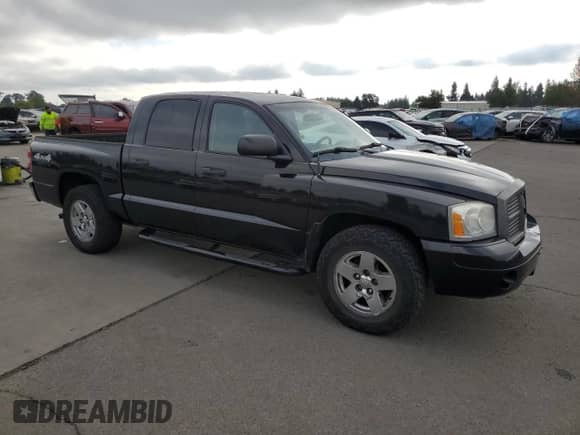 2006 Dodge Dakota SLT z VIN 1D7HW48N56S678965, wystawiony jako Copart lot #70227054 z przebiegiem 159 890 mil mil oraz Szkoda całkowita • Salvage title. Historia ofert i sprzedaży dostępna na DreamBid. Obrazek 4.