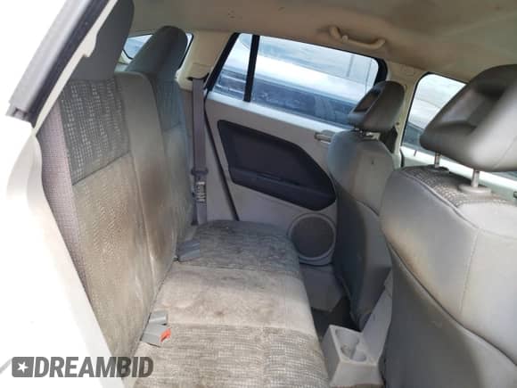 2007 Dodge Caliber SXT z VIN 1B3HB48B27D564683, wystawiony jako Copart lot #73495424 z przebiegiem 88 463 mil mil oraz Nie do naprawy • Non repairable. Historia ofert i sprzedaży dostępna na DreamBid. Obrazek 11.