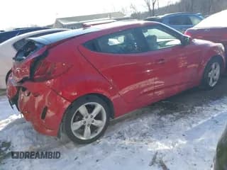 ✅ 2013 Hyundai Veloster w/Black Int • VIN: KMHTC6AD9DU093541 • Lot: 41585034. Wystawiony na IAAI z przebiegiem 66 883 mil. Bezpłatny archiwum sprzedaży aukcyjnych z USA i szczegółowy raport historii pojazdu na DreamBid. Zdjęcie 4.