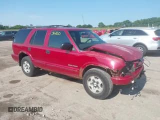 ✅ 2002 Chevrolet Blazer LS • VIN: 1GNDT13W72K212133 • Lot: 42836160. Wystawiony na IAAI z przebiegiem 164 057 mil. Bezpłatny archiwum sprzedaży aukcyjnych z USA i szczegółowy raport historii pojazdu na DreamBid. Zdjęcie 1.