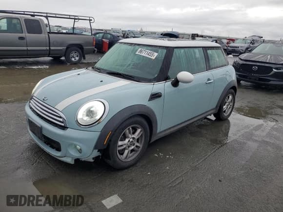 ✅ 2012 MINI Hardtop • VIN: WMWSU3C58CT259275 • Lot: 86711455. Listed on Copart with 127,744 mi. Free auction sales archive from the USA and detailed vehicle history report at DreamBid. Image 1.