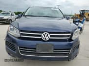 ✅ 2013 Volkswagen Touareg Exec • VIN: WVGEF9BP6DD013915 • Lot: 55024485. Listed on Copart with 238,848 mi. Free auction sales archive from the USA and detailed vehicle history report at DreamBid. Image 5.