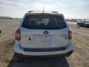 ✅ 2015 Subaru Forester Touring • VIN: JF2SJAWC4FH520517 • Lot: 91050525. Listed on Copart with 105,620 mi. Free auction sales archive from the USA and detailed vehicle history report at DreamBid. Image 6.