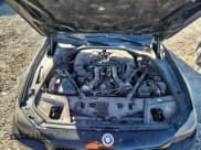 ✅ 2015 BMW 5 Series 550i xDrive • VIN: WBAKP9C56FD979408 • Лот: 91475745. Опубликован ранее на Copart с пробегом 99 712 миль. Бесплатный доступ к архиву аукционных продаж из США и подробный отчёт об истории автомобиля на DreamBid. Изображение 11.