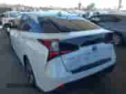 2021 Toyota Prius L Eco with VIN JTDKAMFU4M3134943, listed as a IAAI auction lot 43175713 with 106,611 mi miles and . Bid and sale history available at DreamBid. Image 3.