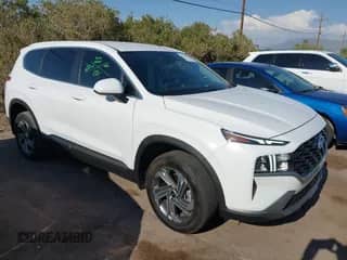 2023 Hyundai Santa Fe SE z VIN 5NMS1DAJ2PH605216, wystawiony jako IAAI lot #42935561 z przebiegiem 12 390 mil mil oraz . Historia ofert i sprzedaży dostępna na DreamBid. Obrazek 1.