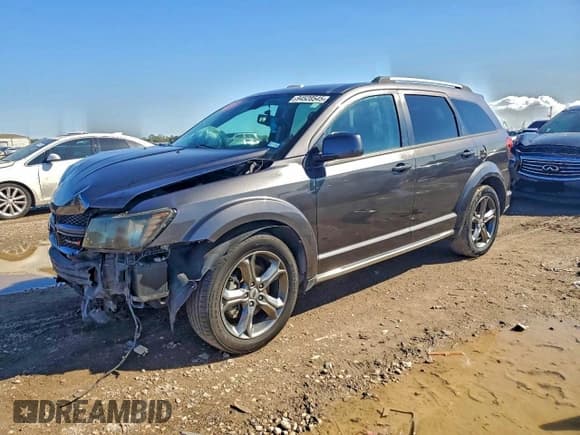 ✅ 2018 Dodge Journey Crossroad • VIN: 3C4PDCGG2JT215861 • Lot: 94528545. Listed on Copart with 150,584 mi. Free auction sales archive from the USA and detailed vehicle history report at DreamBid. Image 1.