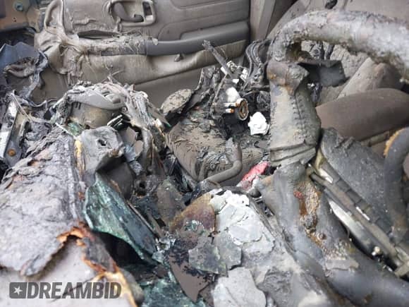 1999 Chevrolet Blazer LT z VIN 1GNDT13W9X2240796, wystawiony jako IAAI lot #41919664 z przebiegiem Nie podano mil oraz . Historia ofert i sprzedaży dostępna na DreamBid. Obrazek 11.