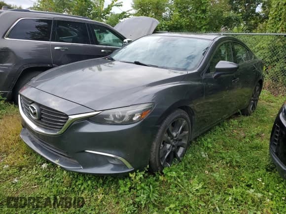 ✅ 2016 Mazda 6 i Grand Touring • VIN: JM1GJ1W54G1426993 • Lot: 80936085. Wystawiony na Copart z przebiegiem 143 321 mil. Bezpłatny archiwum sprzedaży aukcyjnych z USA i szczegółowy raport historii pojazdu na DreamBid. Zdjęcie 2.