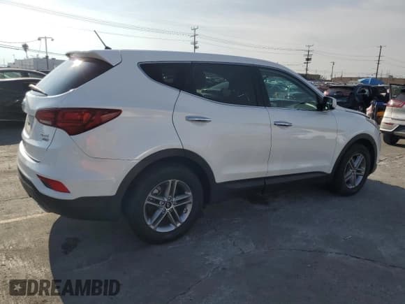 ✅ 2018 Hyundai Santa Fe 2.4L • VIN: 5XYZTDLB7JG557549 • Лот: 91684335. Опубликован ранее на Copart с пробегом 70 960 миль. Бесплатный доступ к архиву аукционных продаж из США и подробный отчёт об истории автомобиля на DreamBid. Изображение 3.