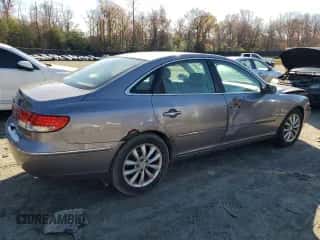 2007 Hyundai Azera SE z VIN KMHFC46FX7A145437, wystawiony jako Copart lot #81969804 z przebiegiem 168 122 mil mil oraz Szkoda całkowita • Salvage title. Historia ofert i sprzedaży dostępna na DreamBid. Obrazek 3.