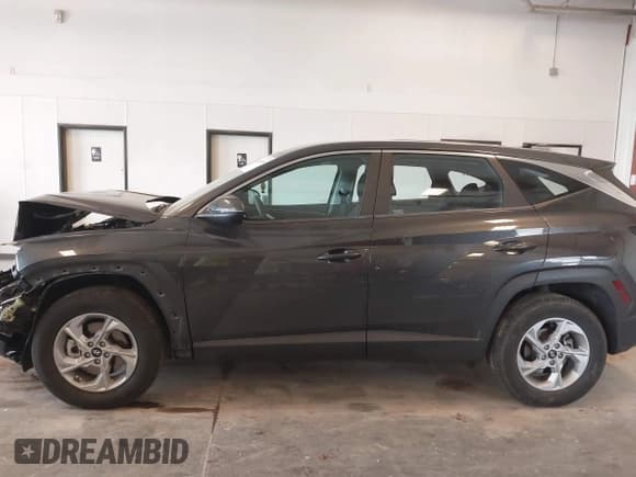 ✅ 2022 Hyundai Tucson SE • VIN: 5NMJACAE2NH079336 • Lot: 42364430. Wystawiony na IAAI z przebiegiem 23 981 mil. Bezpłatny archiwum sprzedaży aukcyjnych z USA i szczegółowy raport historii pojazdu na DreamBid. Zdjęcie 14.