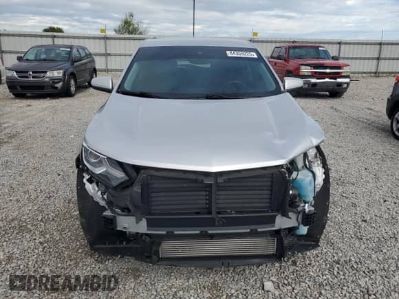 2020 Chevrolet Equinox LT z VIN 3GNAXKEVXLS709491, wystawiony jako Copart lot #84359225 z przebiegiem 81 747 mil mil oraz Szkoda całkowita • Salvage title. Historia ofert i sprzedaży dostępna na DreamBid. Obrazek 5.