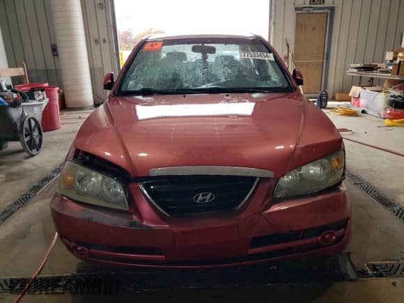 2004 Hyundai Elantra GLS z VIN KMHDN46D64U735399, wystawiony jako Copart lot #77533454 z przebiegiem Nie podano mil oraz Szkoda całkowita • Salvage title. Historia ofert i sprzedaży dostępna na DreamBid. Obrazek 5.