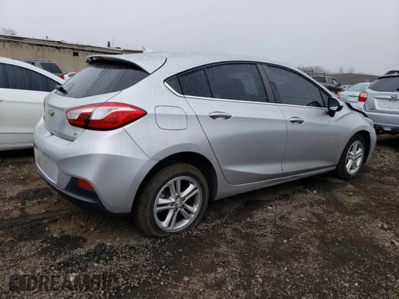 ✅ 2018 Chevrolet Cruze LT • VIN: 3G1BE6SM8JS613774 • Lot: 47378243. Listed on Copart with 64,070 mi. Free auction sales archive from the USA and detailed vehicle history report at DreamBid. Image 3.