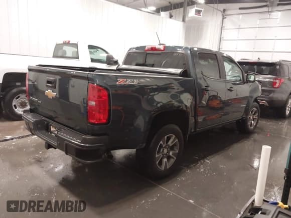 ✅ 2020 Chevrolet Colorado 4WD Z71 • VIN: 1GCGTDEN1L1163546 • Лот: 41706719. Опубликован ранее на IAAI с пробегом 64 662 миль. Бесплатный доступ к архиву аукционных продаж из США и подробный отчёт об истории автомобиля на DreamBid. Изображение 4.