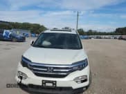 ✅ 2017 Honda Pilot EX-L • VIN: 5FNYF6H57HB044837 • Lot: 81679385. Listed on Copart with 154,324 mi. Free auction sales archive from the USA and detailed vehicle history report at DreamBid. Image 14.