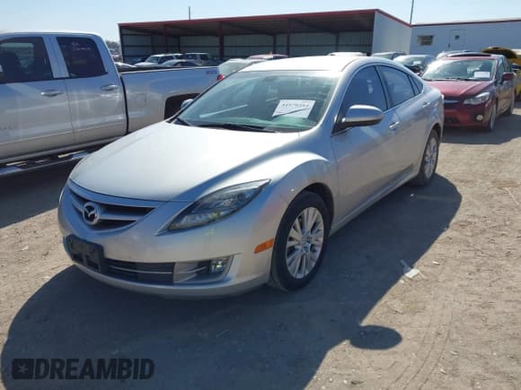 ✅ 2009 Mazda 6 i Touring • VIN: 1YVHP82A795M31562 • Lot: 41970484. Listed on IAAI with 128,724 mi. Free auction sales archive from the USA and detailed vehicle history report at DreamBid. Image 2.