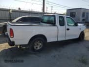 ✅ 2001 Ford F-150 • VIN: 2FTZX17271CA44734 • Lot: 52202555. Wystawiony na Copart z przebiegiem Nie podano. Bezpłatny archiwum sprzedaży aukcyjnych z USA i szczegółowy raport historii pojazdu na DreamBid. Zdjęcie 3.