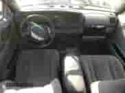 2000 Dodge Dakota Sport z VIN 1B7GL2AZ4YS722151, wystawiony jako Copart lot #87870705 z przebiegiem 169 435 mil mil oraz Szkoda całkowita • Salvage title. Historia ofert i sprzedaży dostępna na DreamBid. Obrazek 8.