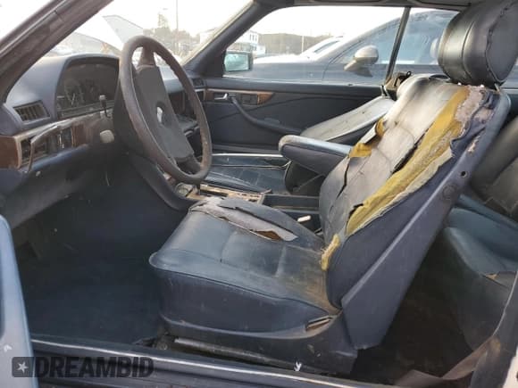 ✅ 1984 Mercedes-Benz 500 • VIN: WDB1260441A061720 • Лот: 93342945. Опубликован ранее на Copart с пробегом 117 508 миль. Бесплатный доступ к архиву аукционных продаж из США и подробный отчёт об истории автомобиля на DreamBid. Изображение 7.