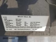 ✅ 2023 Tesla Model Y Long Range • VIN: 7SAYGAEE2PF646213 • Lot: 84785885. Listed on Copart with Not provided. Free auction sales archive from the USA and detailed vehicle history report at DreamBid. Image 14.