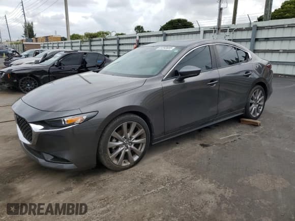 ✅ 2021 Mazda 3 Preferred • VIN: 3MZBPBCL6MM200094 • Lot: 81243655. Listed on Copart with 72,167 mi. Free auction sales archive from the USA and detailed vehicle history report at DreamBid. Image 1.