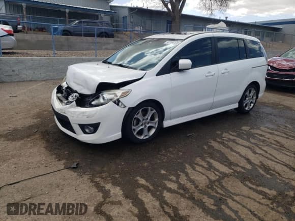 ✅ 2010 Mazda 5 Sport • VIN: JM1CR2W33A0385622 • Лот: 47194125. Опубликован ранее на Copart с пробегом 165 721 миль. Бесплатный доступ к архиву аукционных продаж из США и подробный отчёт об истории автомобиля на DreamBid. Изображение 1.