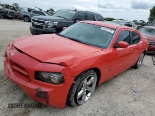 2009 Dodge Charger R/T z VIN 2B3LA53T79H513107, wystawiony jako Copart lot #69858795 z przebiegiem 204 238 mil mil oraz Szkoda całkowita • Salvage title. Historia ofert i sprzedaży dostępna na DreamBid. Obrazek 1.